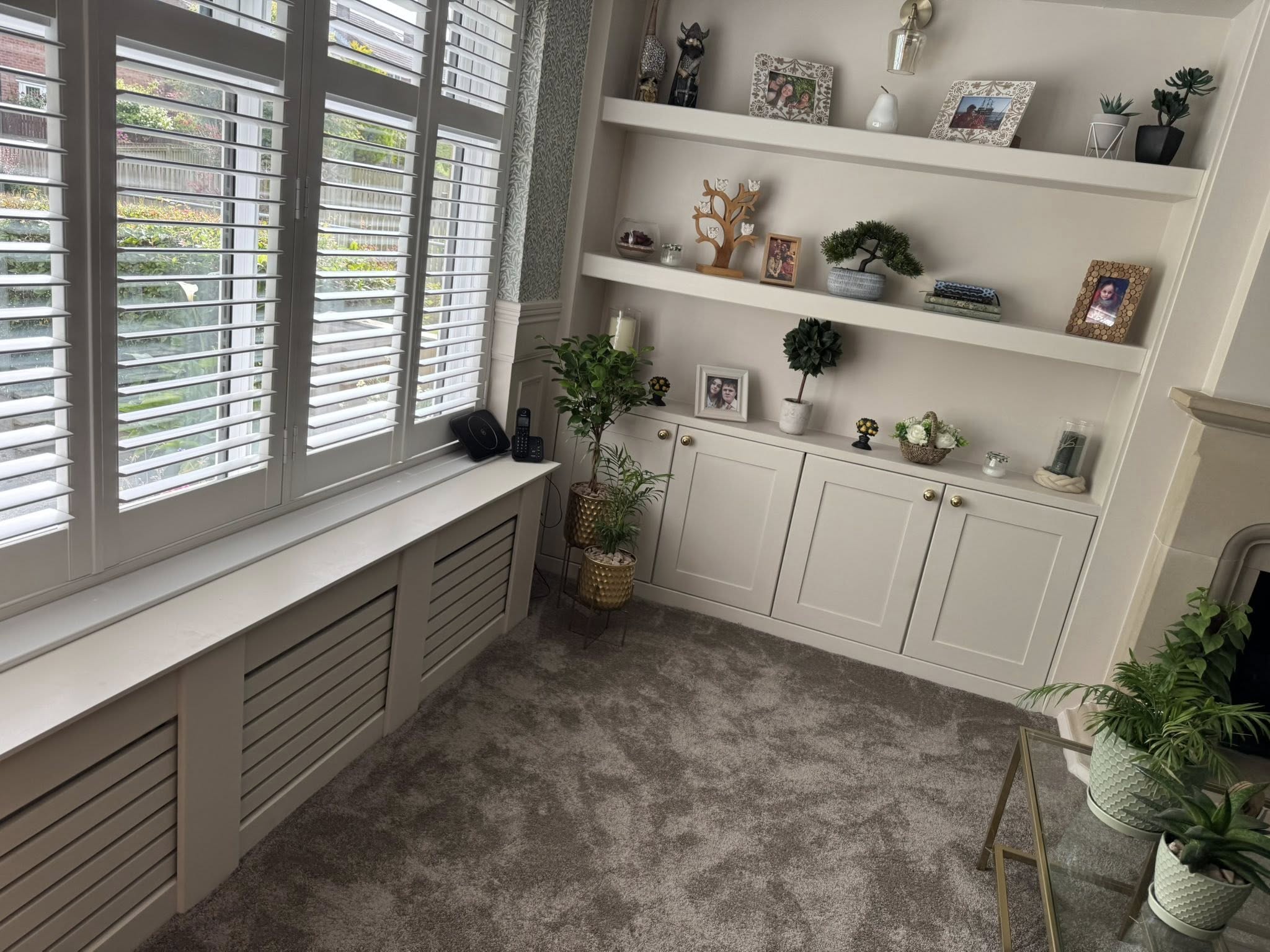 Bespoke alcove cupboards built into living room recesses in Cardiff
