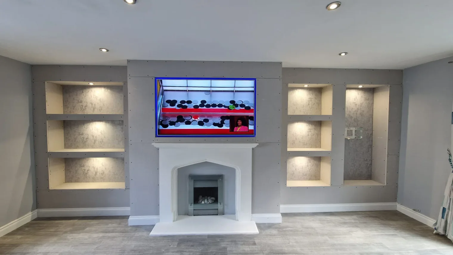 Bespoke media wall Cardiff featuring integrated acoustic panelling and ambient LED lighting