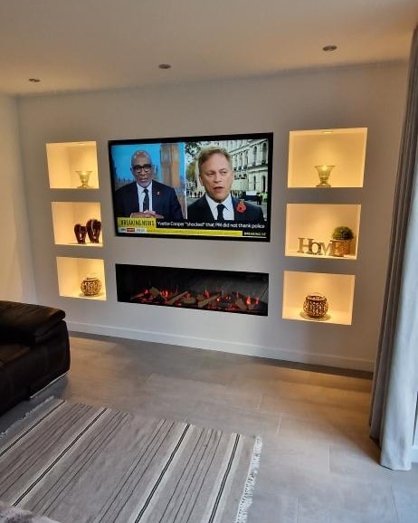 Custom media wall installation in Caerphilly with seamless television integration